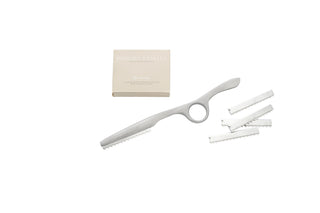 Hair extension kit includes scissors and scissors box.