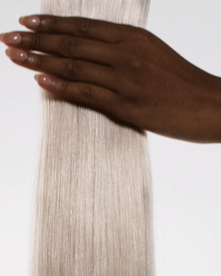 Animation of Glam Seamless platinum blonde hair extensions.
