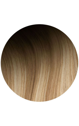 White background showcasing glamorous Bahamian Balayage hair extension example.