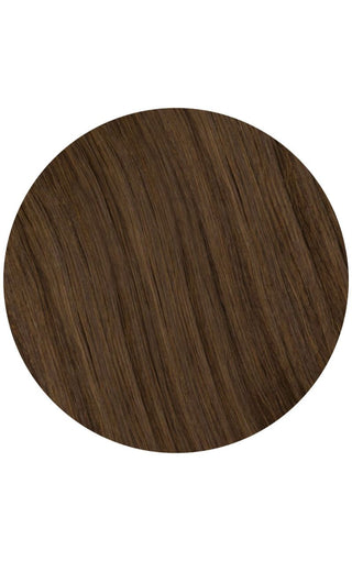 Bronzed brown highlights of a swatch of hair strand example on a white background.