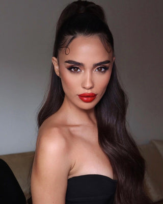 Long, sleek Glam Seamless natural black hair extensions for a flawless, natural look.