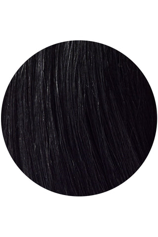 A close-up of jet black hair extensions displayed against a clean white background, showcasing their rich color and texture.