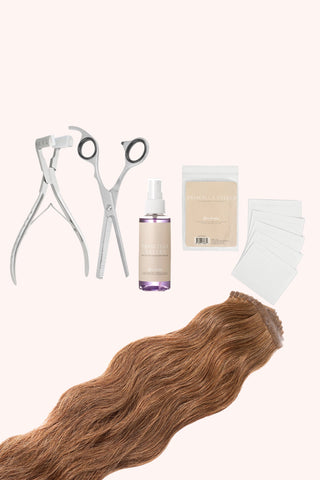 Hand-tied tape-ins Pro Starter Kit with various hair extension tools and accessories displayed.